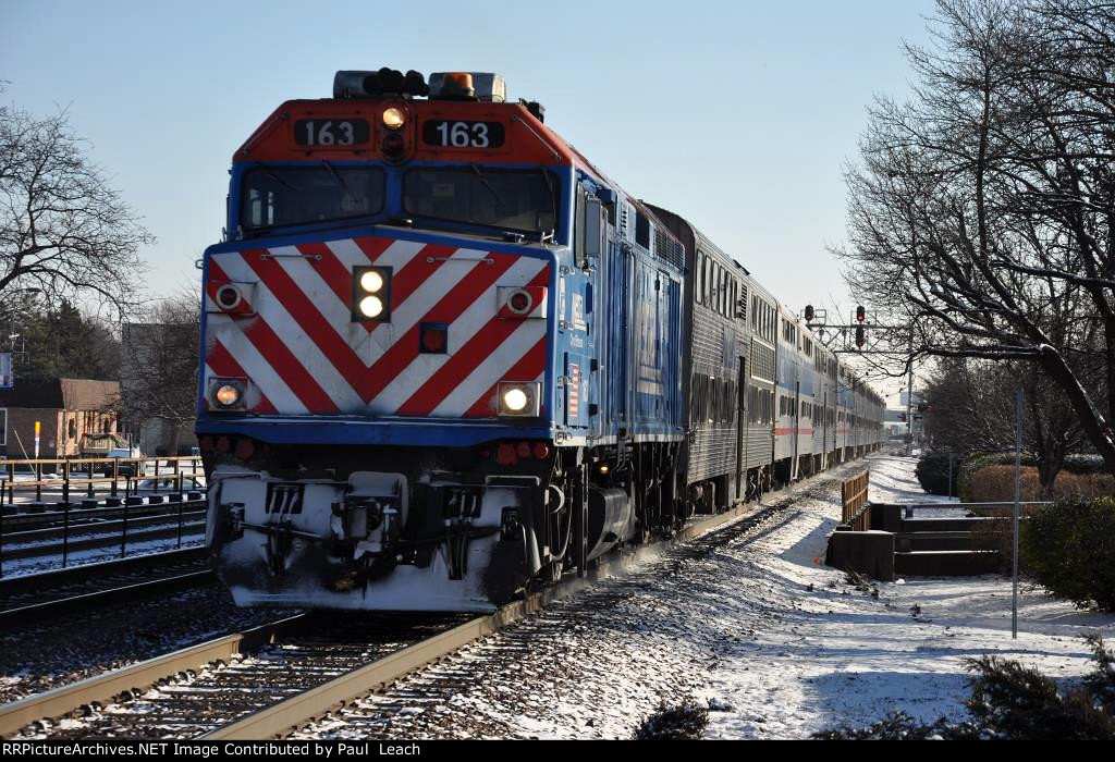 Outbound commuter comes into the station